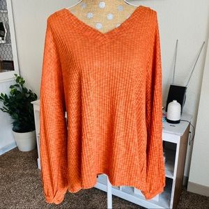 Ridged stretchy orange long sleeve top